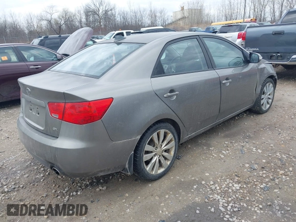 2010 Kia Forte SX with VIN KNAFW4A31A5048066, listed as a IAAI auction lot 42102810 with 160,998 mi miles. Bid and sale history available at carsss.com. Image 4.