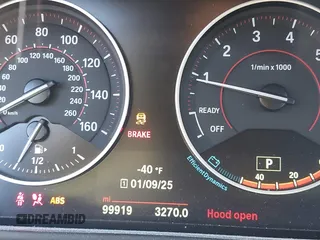2015 BMW 2 Series 228i with VIN WBA1F5C53FV257153, listed as a IAAI auction lot 41294335 with 99,919 mi miles. Bid and sale history available at carsss.com. Image 7.