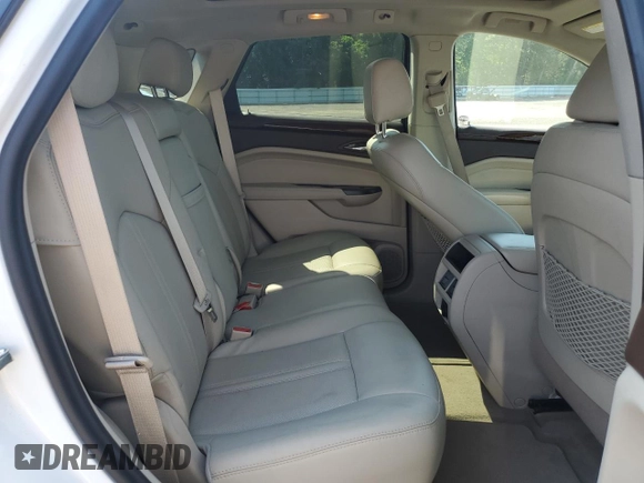 2014 Cadillac SRX Performance Collection with VIN 3GYFNCE38ES629600, listed as a Copart auction lot 61622725 with 86,183 mi miles and Salvage title. Bid and sale history available at DreamBid. Image 11.