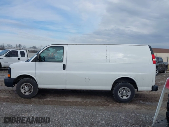 2014 Chevrolet Express Cargo Van with VIN 1GCWGFCA2E1148147, listed as a IAAI auction lot 41101132 with 110,648 mi miles. Bid and sale history available at carsss.com. Image 13.
