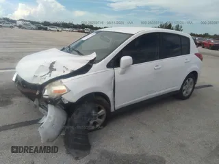 2009 Nissan Versa 1.8 S with VIN 3N1BC13E99L406584, listed as a IAAI auction lot 41687026 with 107,454 mi miles. Bid and sale history available at carsss.com. Image 2.