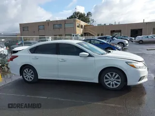 2016 Nissan Altima SR with VIN 1N4AL3AP5GC220645, listed as a IAAI auction lot 41938564 with 202,222 mi miles and . Bid and sale history available at carsss.com. Image 13.