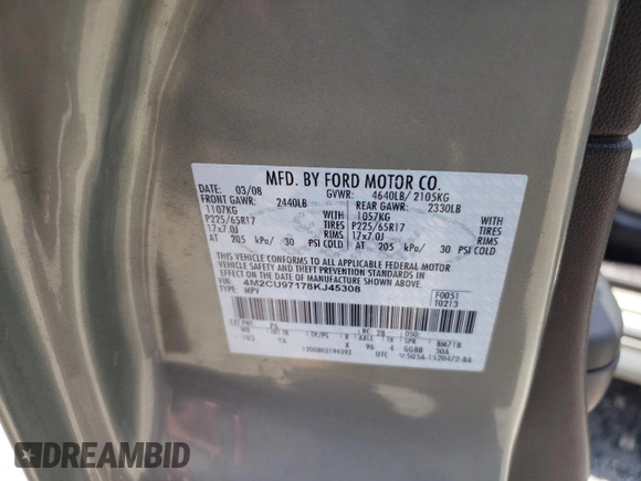 2008 Mercury Mariner Premier with VIN 4M2CU97178KJ45308, listed as a Copart auction lot 64947075 with 140,403 mi miles and Salvage title. Bid and sale history available at DreamBid. Image 13.