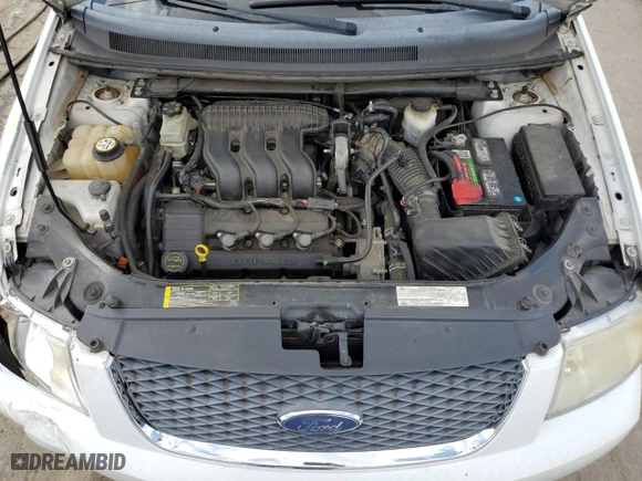2007 Ford Freestyle SEL with VIN 1FMDK02197GA24604, listed as a Copart auction lot 74915664 with 243,960 mi miles and Salvage Title. Bid and sale history available at carsss.com. Image 12.