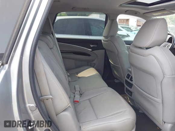 2020 Acura MDX with VIN 5J8YD3H39LL016466, listed as a IAAI auction lot 42376611 with 74,873 mi miles and . Bid and sale history available at DreamBid. Image 8.