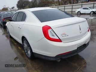 2013 Lincoln MKS with VIN 1LNHL9DK4DG605058, listed as a IAAI auction lot 41068489 with 101,801 mi miles. Bid and sale history available at carsss.com. Image 3.