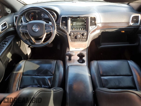 2015 Jeep Grand Cherokee Overland with VIN 1C4RJFCT8FC619014, listed as a Copart auction lot 44304375 with 123,767 mi miles and Salvage Title. Bid and sale history available at carsss.com. Image 8.