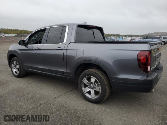 2024 Honda Ridgeline RTL with VIN 5FPYK3F54RB016029, listed as a Copart auction lot 82542864 with 6,745 mi miles and Salvage title. Bid and sale history available at DreamBid. Image 2.