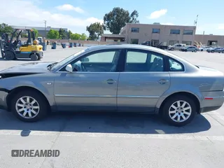 2003 Volkswagen Passat GLS z VIN WVWPD63B93P045100, wystawiony jako IAAI lot #42349064 z przebiegiem 173 929 mil mil oraz . Historia ofert i sprzedaży dostępna na DreamBid. Obrazek 14.
