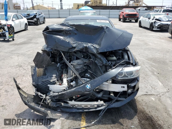 2014 BMW 4 Series 428i xDrive z VIN WBA3N9C56EF722472, wystawiony jako Copart lot #59873185 z przebiegiem 129 926 mil mil oraz Szkoda całkowita • Salvage title. Historia ofert i sprzedaży dostępna na DreamBid. Obrazek 5.