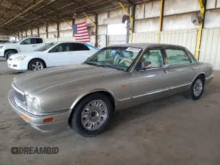 1996 Jaguar XJ Vanden Plas z VIN SAJKX6245TC785370, wystawiony jako Copart lot #60402915 z przebiegiem 122 502 mil mil oraz Szkoda całkowita • Salvage title. Historia ofert i sprzedaży dostępna na DreamBid. Obrazek 1.