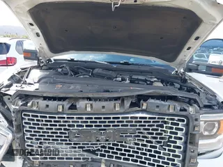 2016 GMC Sierra 2500HD Denali z VIN 1GT12UE88GF170375, wystawiony jako IAAI lot #41885873 z przebiegiem 150 108 mil mil oraz . Historia ofert i sprzedaży dostępna na DreamBid. Obrazek 10.