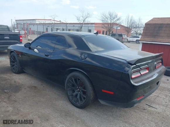 2019 Dodge Challenger R/T Scat Pack with VIN 2C3CDZFJ4KH618527, listed as a IAAI auction lot 41842986 with 106,389 mi miles. Bid and sale history available at carsss.com. Image 3.
