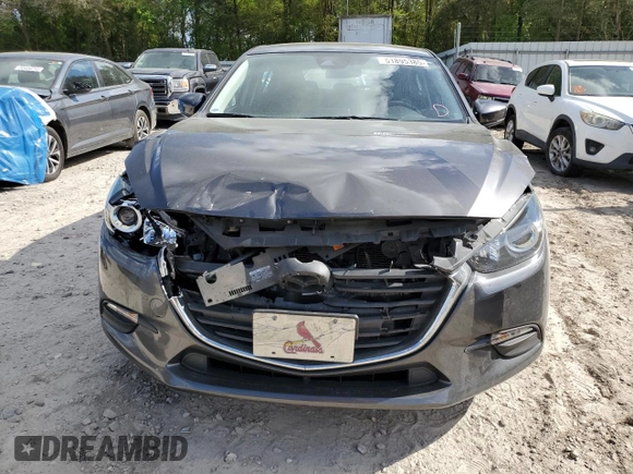 2017 Mazda 3 Touring with VIN 3MZBN1L77HM117864, listed as a Copart auction lot 51895385 with 63,076 mi miles and Salvage Title. Bid and sale history available at carsss.com. Image 5.
