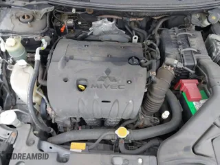 2009 Mitsubishi Lancer ES with VIN JA3AU26U69U042899, listed as a IAAI auction lot 41962186 with 179,262 mi miles. Bid and sale history available at carsss.com. Image 10.