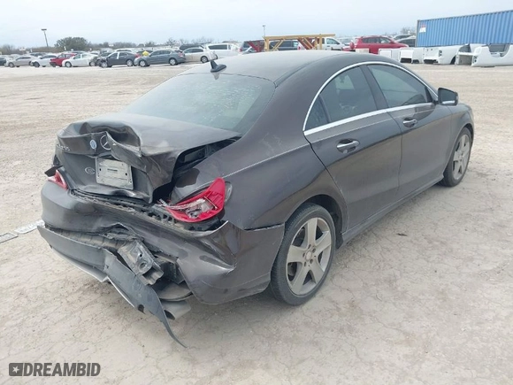 2015 Mercedes-Benz CLA-Class CLA 250 with VIN WDDSJ4EBXFN185179, listed as a IAAI auction lot 41675229 with 104,131 mi miles. Bid and sale history available at carsss.com. Image 4.