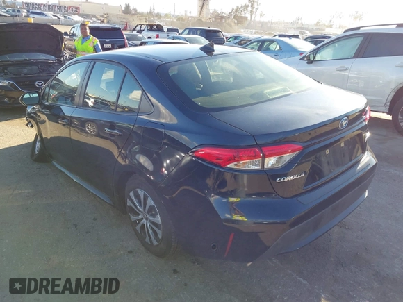 2021 Toyota Corolla Hybrid LE with VIN JTDEAMDE5MJ014959, listed as a IAAI auction lot 41751203 with 26,220 mi miles. Bid and sale history available at carsss.com. Image 3.