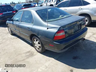 1994 Honda Accord EX with VIN JHMCD5652RC096984, listed as a IAAI auction lot 41734743 with 199,052 mi miles. Bid and sale history available at carsss.com. Image 3.