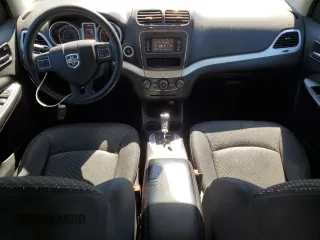 2015 Dodge Journey SE z VIN 3C4PDCAB8FT553477, wystawiony jako Copart lot #58097985 z przebiegiem 145 570 mil mil oraz Szkoda całkowita • Salvage title. Historia ofert i sprzedaży dostępna na DreamBid. Obrazek 8.