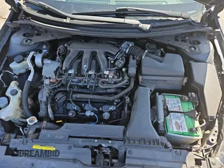 2012 Nissan Altima 3.5 SR with VIN 1N4BL2EP8CC185909, listed as a Copart auction lot 54571915 with 154,088 mi miles and Clean Title. Bid and sale history available at carsss.com. Image 7.