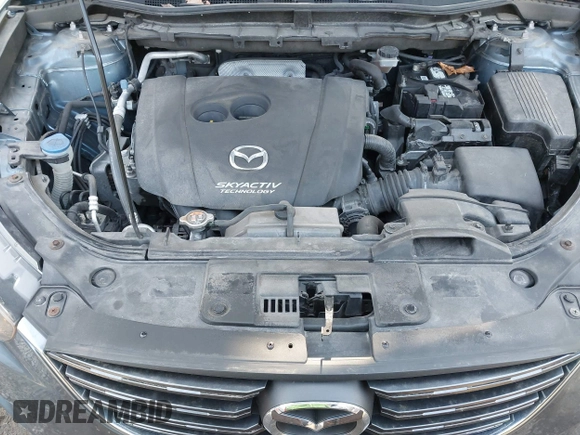 2016 Mazda CX-5 Touring with VIN JM3KE4CY5G0771252, listed as a IAAI auction lot 42138637 with 106,767 mi miles and . Bid and sale history available at carsss.com. Image 10.