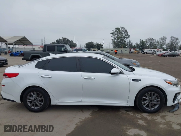 2020 Kia Optima LX z VIN 5XXGT4L3XLG422203, wystawiony jako IAAI lot #42290010 z przebiegiem 38 284 mil mil oraz . Historia ofert i sprzedaży dostępna na DreamBid. Obrazek 13.