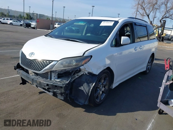 2015 Toyota Sienna SE with VIN 5TDXK3DC6FS627578, listed as a IAAI auction lot 41568684 with 124,138 mi miles and . Bid and sale history available at DreamBid. Image 2.