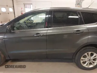 2017 Ford Escape SE with VIN 1FMCU9G90HUC96633, listed as a IAAI auction lot 42005904 with 93,139 mi miles. Bid and sale history available at carsss.com. Image 14.
