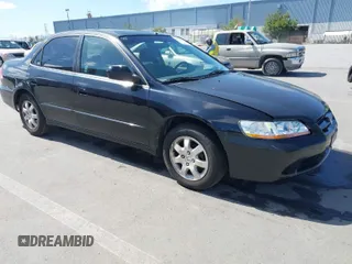 1998 Honda Accord EX z VIN 1HGCG6670WA061112, wystawiony jako IAAI lot #41990299 z przebiegiem 298 590 mil mil oraz . Historia ofert i sprzedaży dostępna na DreamBid. Obrazek 1.