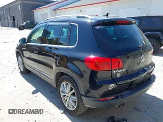 2012 Volkswagen Tiguan SEL with VIN WVGAV7AX2CW529232, listed as a IAAI auction lot 41955121 with 164,885 mi miles and . Bid and sale history available at DreamBid. Image 3.