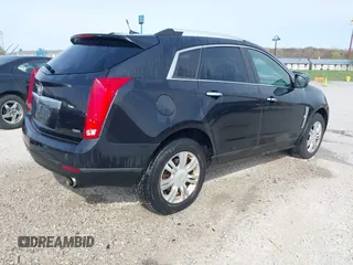 2012 Cadillac SRX Luxury Collection with VIN 3GYFNAE37CS651847, listed as a IAAI auction lot 41929524 with 144,961 mi miles and . Bid and sale history available at carsss.com. Image 4.