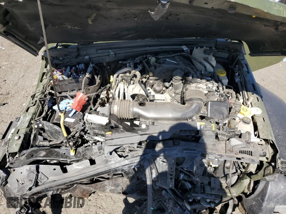 2023 Jeep Wrangler Willys z VIN 1C4HJXAG6PW546281, wystawiony jako Copart lot #74006354 z przebiegiem 21 417 mil mil oraz Szkoda całkowita • Salvage title. Historia ofert i sprzedaży dostępna na DreamBid. Obrazek 13.
