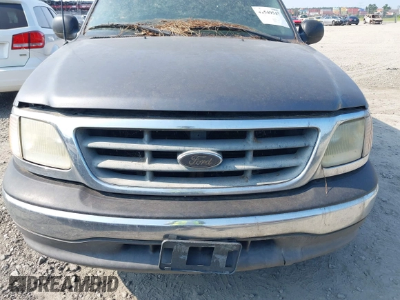 2003 Ford F-150 XL with VIN 2FTRX07W93CB11978, listed as a IAAI auction lot 42549547 with 209,486 mi miles and . Bid and sale history available at DreamBid. Image 6.