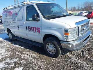 2014 Ford Econoline Cargo Commercial with VIN 1FTNE2EW3EDA18900, listed as a IAAI auction lot 41209002 with 138,014 mi miles. Bid and sale history available at carsss.com. Image 1.