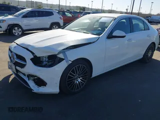 2022 Mercedes-Benz C 300 with VIN W1KAF4GB4NR020021, listed as a IAAI auction lot 41412120 with 14,430 mi miles and . Bid and sale history available at DreamBid. Image 2.
