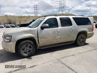 2014 Chevrolet Suburban LTZ with VIN 1GNSKKE77ER117749, listed as a Copart auction lot 53421465 with 253,473 mi miles and Salvage title. Bid and sale history available at DreamBid. Image 1.
