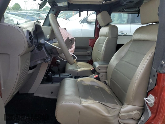 2009 Jeep Wrangler X с VIN 1J4FA24179L760213, выставлен на аукционе Copart как лот 59148545 с пробегом 129 303 миль миль и Списание • Salvage title. История ставок и продаж доступна на DreamBid. Изображение 7.