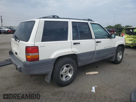 1997 Jeep Grand Cherokee Laredo with VIN 1J4GZ58S2VC676652, listed as a Copart auction lot 64939974 with 256,923 mi miles and Salvage Title. Bid and sale history available at carsss.com. Image 3.