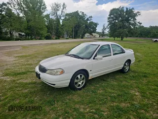 1998 Mercury Mystique z VIN 1MEFM66L2WK653881, wystawiony jako Copart lot #57662125 z przebiegiem 119 189 mil mil oraz Tytuł czysty. Historia ofert i sprzedaży dostępna na DreamBid. Obrazek 2.