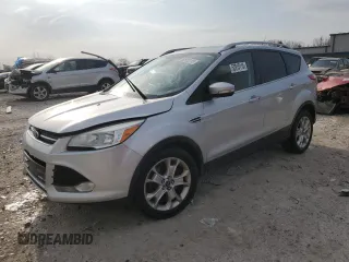 2015 Ford Escape Titanium z VIN 1FMCU9J95FUA85210, wystawiony jako Copart lot #52815115 z przebiegiem Nie podano mil oraz Czysty tytuł • Clean title. Historia ofert i sprzedaży dostępna na DreamBid. Obrazek 1.
