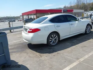 2013 Infiniti M37 with VIN JN1BY1AR3DM600744, listed as a IAAI auction lot 41912310 with 200,014 mi miles. Bid and sale history available at carsss.com. Image 4.