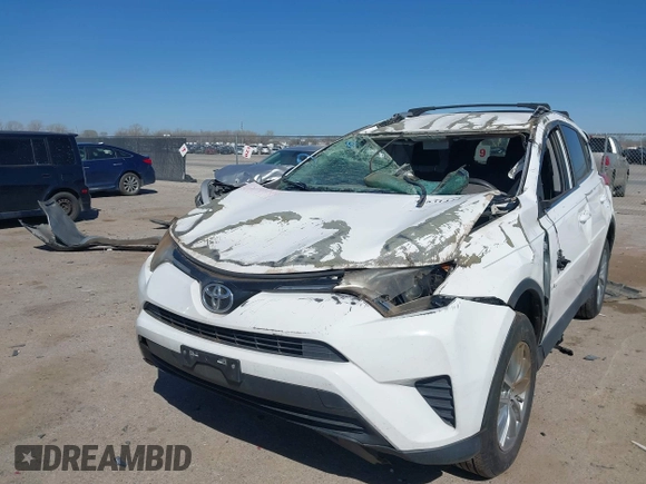 2016 Toyota RAV4 LE with VIN 2T3ZFREV2GW291072, listed as a IAAI auction lot 41831444 with 135,820 mi miles. Bid and sale history available at carsss.com. Image 17.