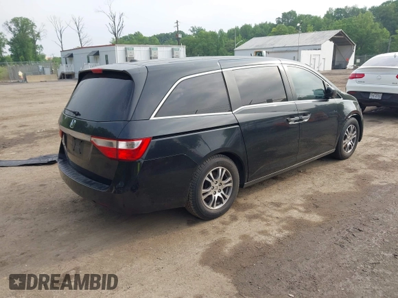 2011 Honda Odyssey EX-L with VIN 5FNRL5H68BB071178, listed as a IAAI auction lot 42286324 with 213,847 mi miles and . Bid and sale history available at DreamBid. Image 4.