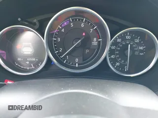 2020 Mazda MX-5 Miata Grand Touring z VIN JM1NDAM79L0411456, wystawiony jako IAAI lot #42229479 z przebiegiem 63 508 mil mil oraz . Historia ofert i sprzedaży dostępna na DreamBid. Obrazek 7.