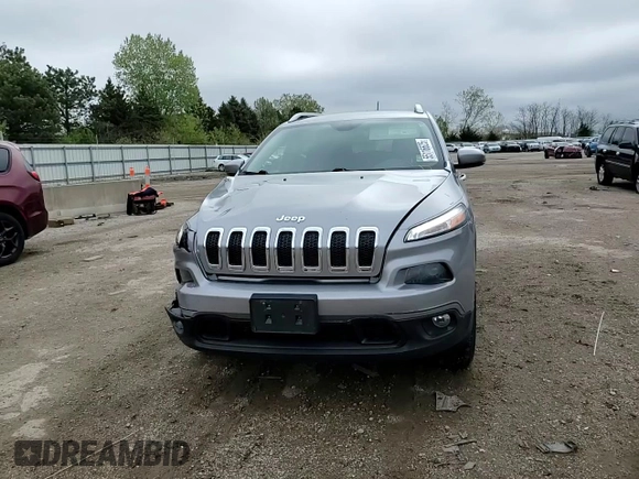 2015 Jeep Cherokee Latitude z VIN 1C4PJMCS2FW684703, wystawiony jako Copart lot #55116625 z przebiegiem 154 049 mil mil oraz Szkoda całkowita • Salvage title. Historia ofert i sprzedaży dostępna na DreamBid. Obrazek 13.