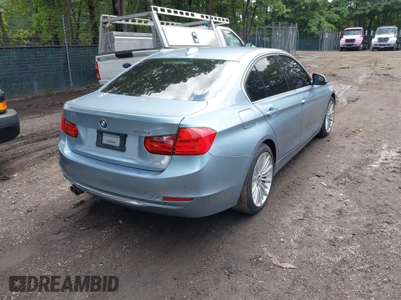 2013 BMW 3 Series 328i z VIN WBA3A5G57DNP19440, wystawiony jako IAAI lot #42540834 z przebiegiem 135 117 mil mil oraz . Historia ofert i sprzedaży dostępna na DreamBid. Obrazek 4.