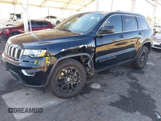 2021 Jeep Grand Cherokee Laredo X with VIN 1C4RJEAG7MC538812, listed as a IAAI auction lot 41337593 with 68,865 mi miles and . Bid and sale history available at DreamBid. Image 2.