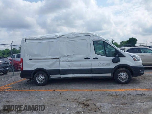 2023 Ford Transit Cargo с VIN 1FTBR2C84PKB85423, выставлен на аукционе IAAI как лот 42099152 с пробегом 48 328 миль миль и . История ставок и продаж доступна на DreamBid. Изображение 13.