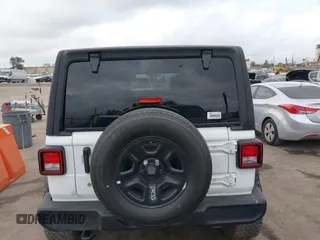 2023 Jeep Wrangler Sport S with VIN 1C4HJXDG0PW638871, listed as a IAAI auction lot 42129295 with 16,171 mi miles and . Bid and sale history available at DreamBid. Image 16.