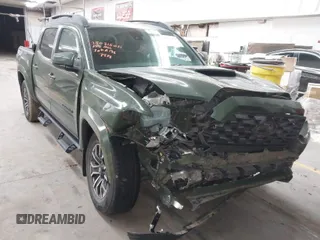 2021 Toyota Tacoma SR z VIN 3TMCZ5AN2MM427838, wystawiony jako IAAI lot #41831229 z przebiegiem 32 850 mil mil oraz . Historia ofert i sprzedaży dostępna na DreamBid. Obrazek 1.